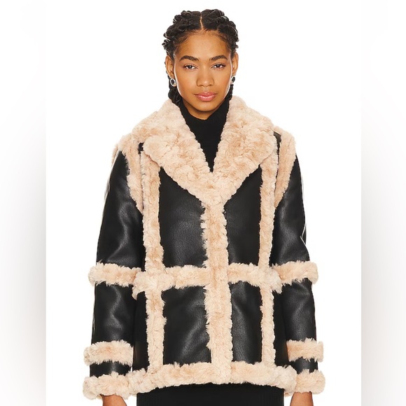 Faux black leather jacket
Seems more like a large. - Picture 1 of 7